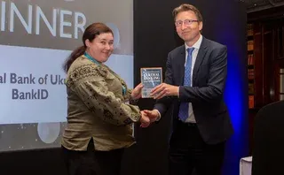 The NBU's Mariana Fostyk - collecting the PMI initiative award