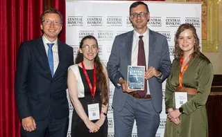 Economic prize winner, Enrique Garcia Marques, with colleagues from the Dallas Fed